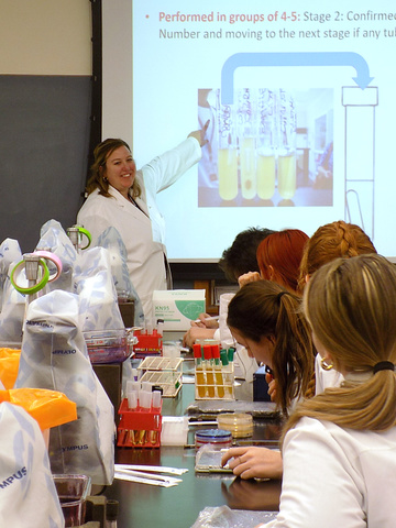 Regina McGrane teaching a lab course