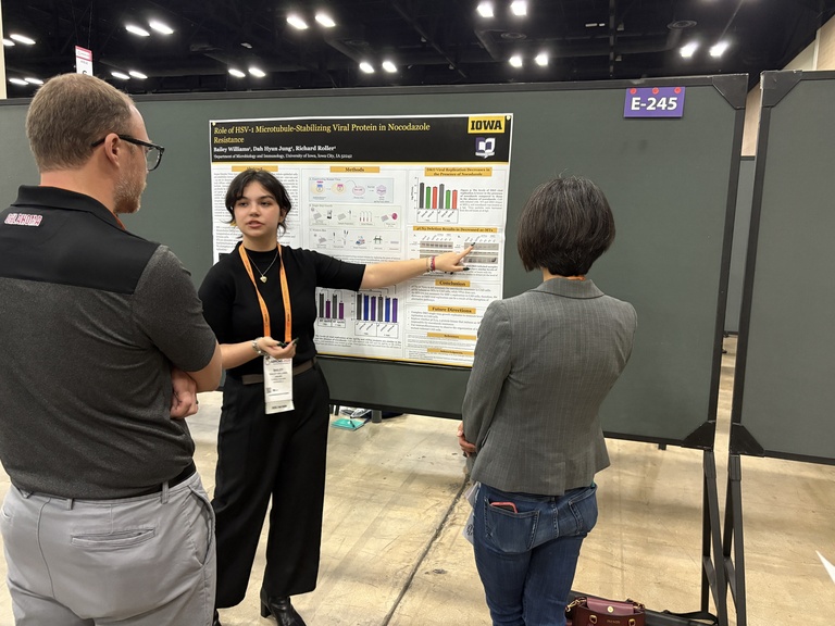 Photo of Bailey Wiliams presenting poster at 2025 ABRCMS Conference