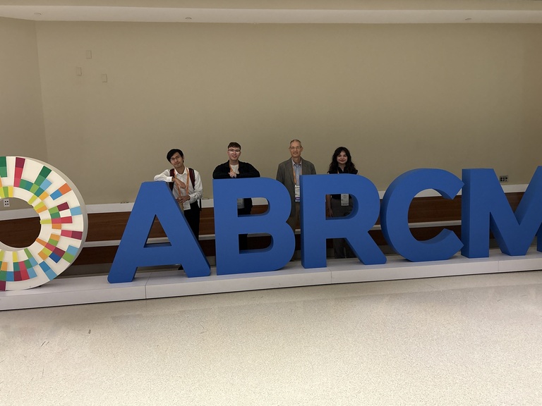 Photo of UIowa 2025 ABRCMS Attendees, Neil Garza Hernandez, Jonathan Featherston, David Weiss, and Bailey Williams