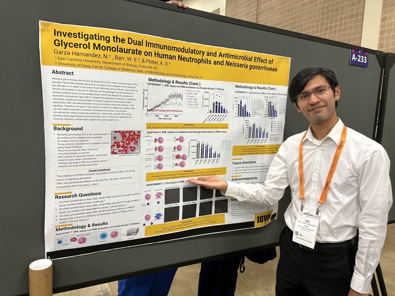 Photo of Neil Garza Hernandez and his poster at the 2025 ABRCMS conference